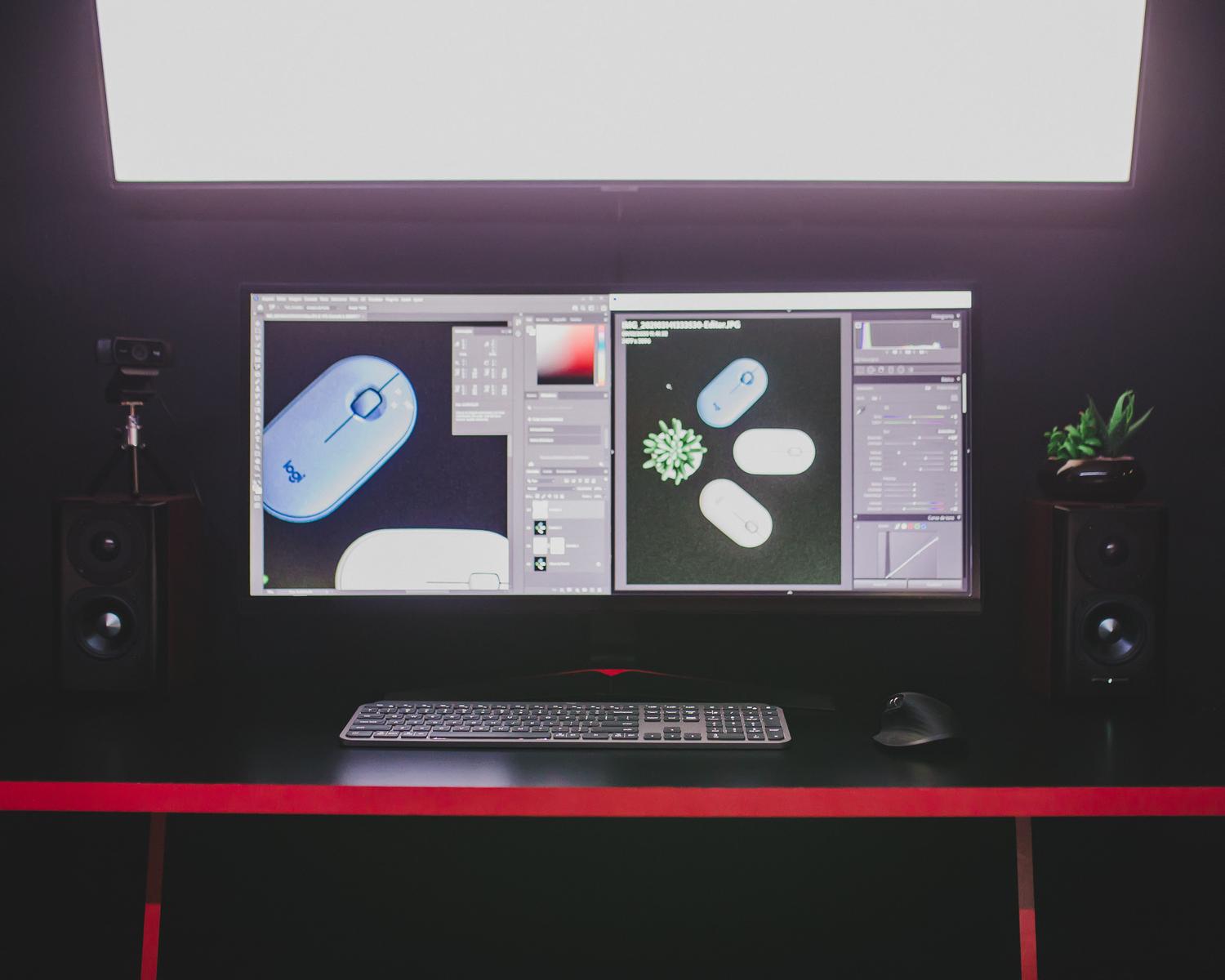 Professional workstation with dual monitors showing different UI scaling levels, perfect for illustrating mixed-DPI issues in Windows.