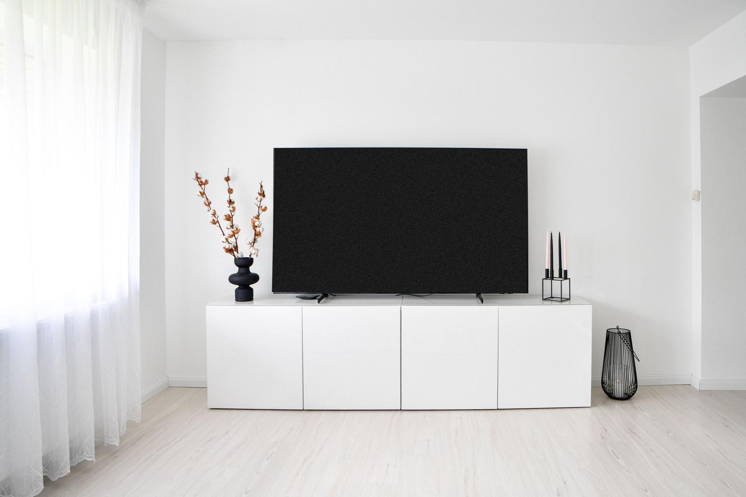 Salón moderno de estilo escandinavo con decoración minimalista y electrónica integrada